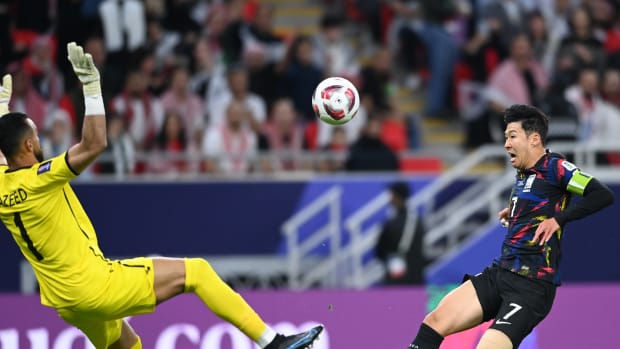 Son Heung-min pictured (right) playing for South Korea against Jordan in the semi-finals of the 2023 AFC Asian Cup in Qatar
